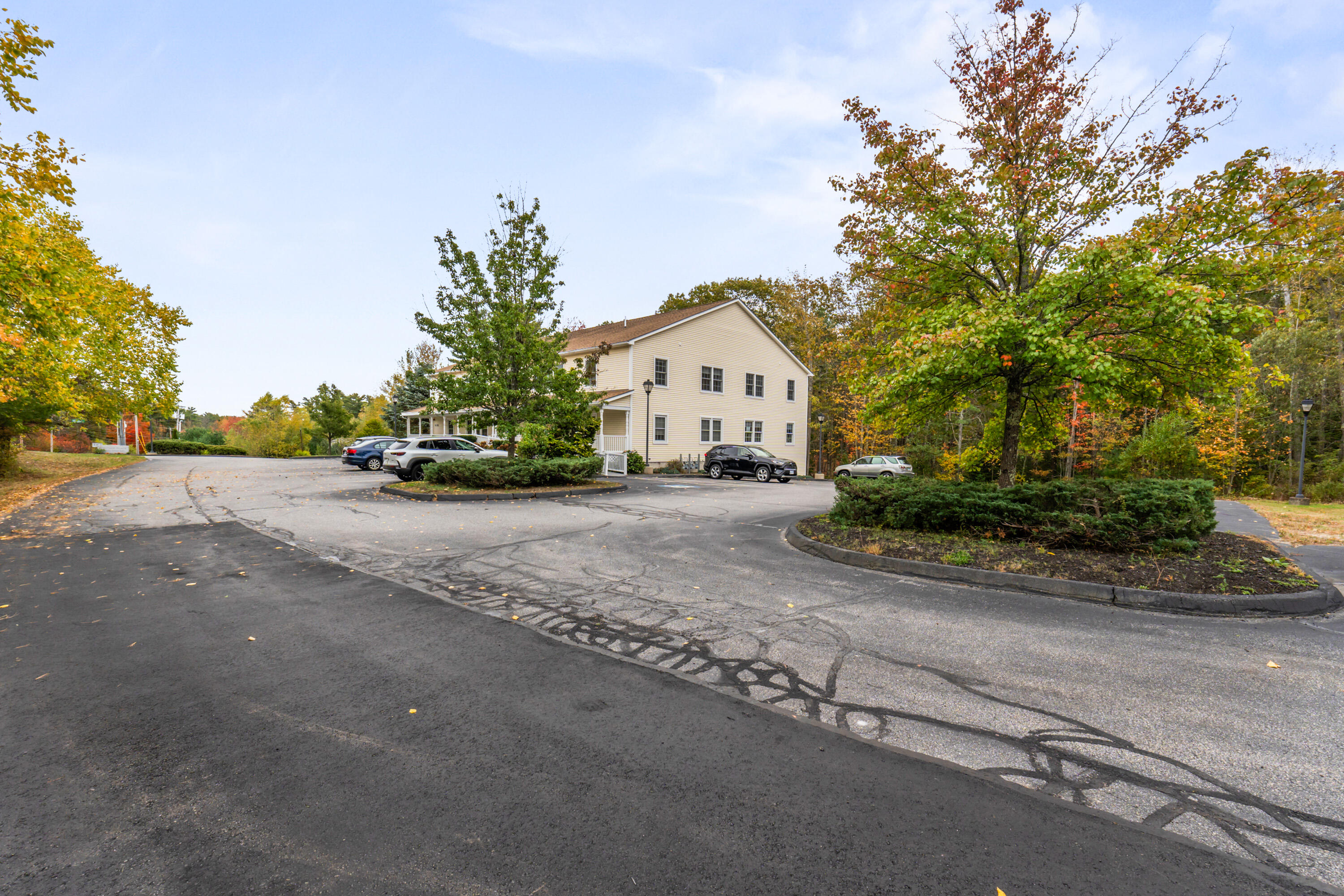 106 Rita Way, Unit 106 Brunswick, ME 04011 - Photo 24 of 31 Ground Level Parking Lot View