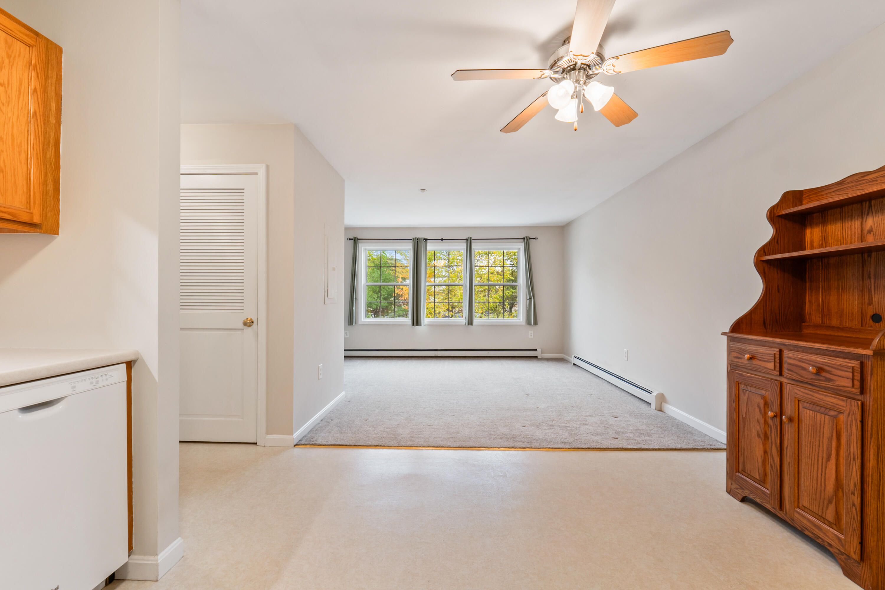 106 Rita Way, Unit 106 Brunswick, ME 04011 - Photo 8 of 31 Kitchen & living room