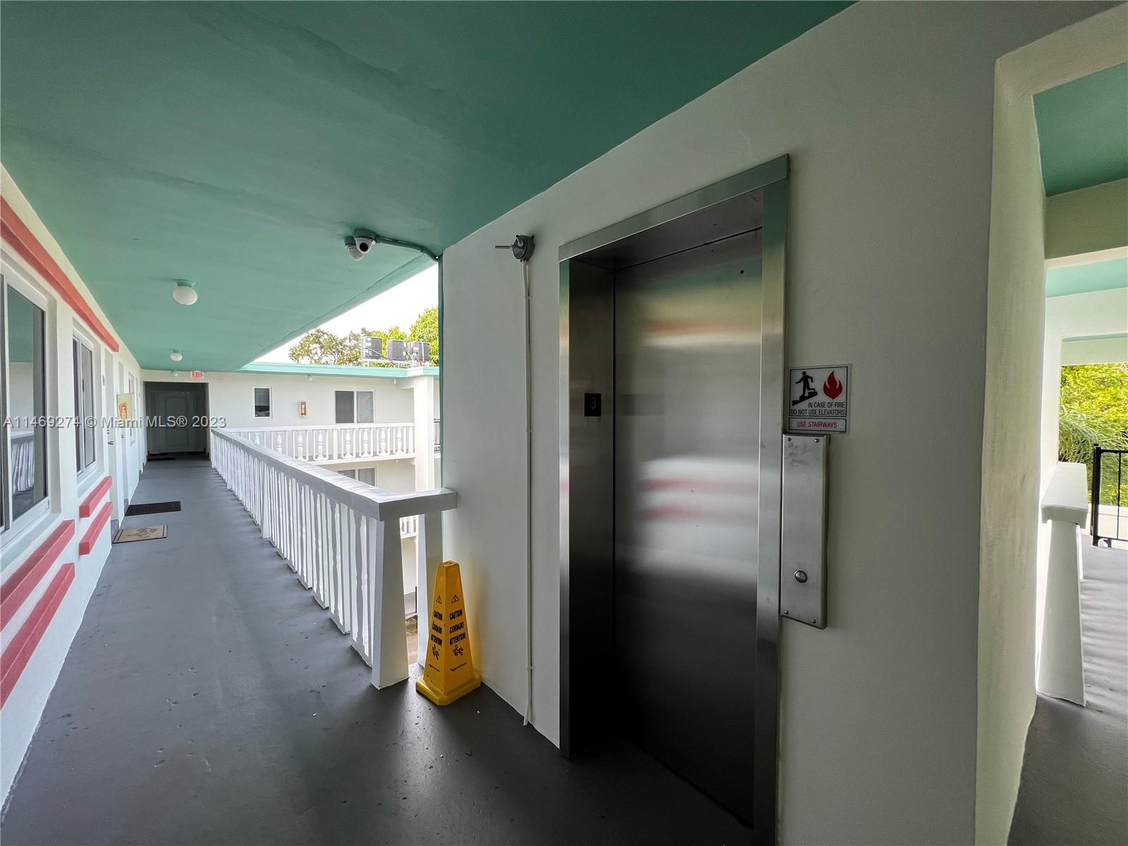 1857 Jefferson Street, Unit 306 Hollywood, FL 33020 - Photo 23 of 23 a view of hallway with livingroom