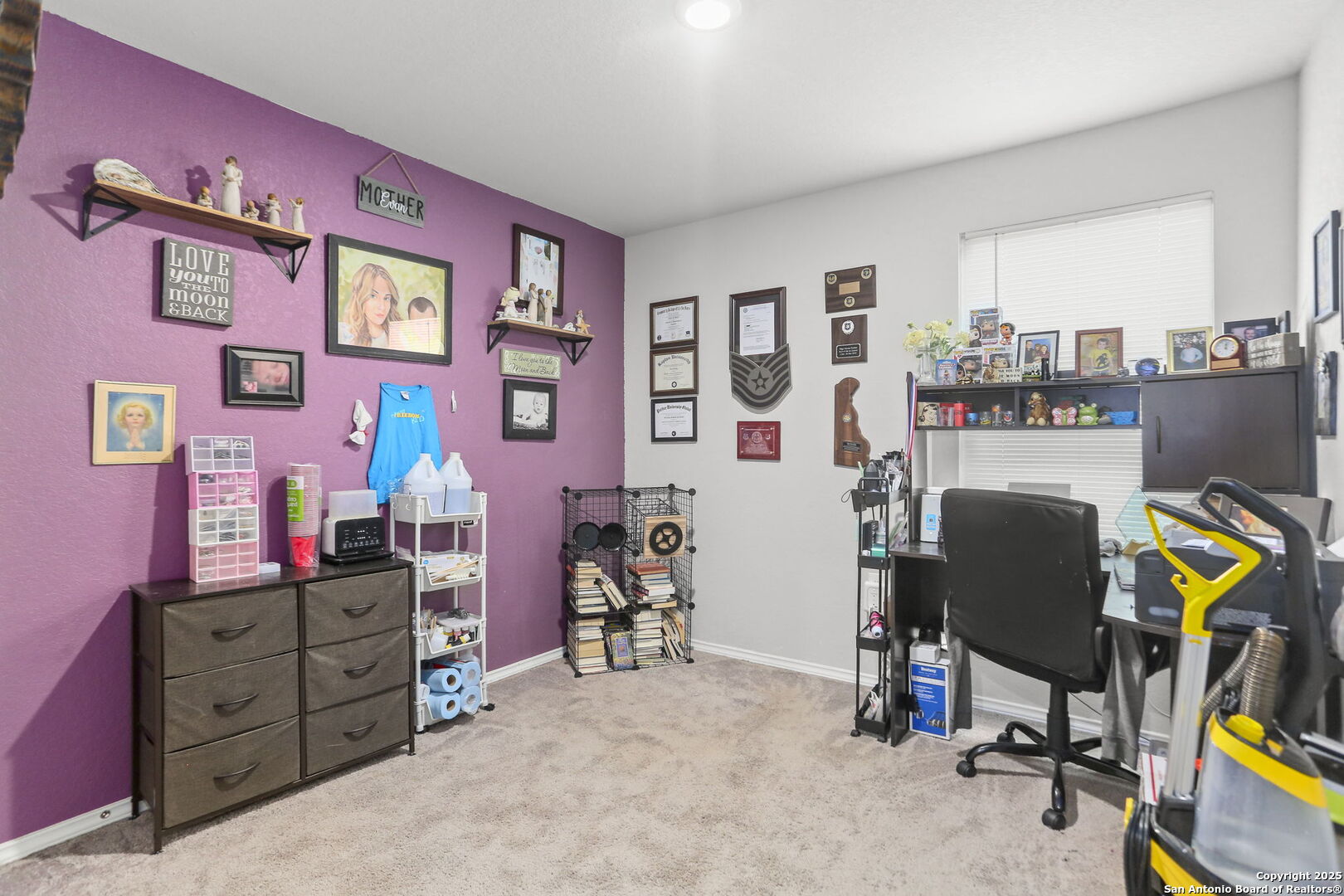 11910 Pewee San Antonio, TX 78221 - Photo 13 of 18 a view of a workspace with furniture and toys