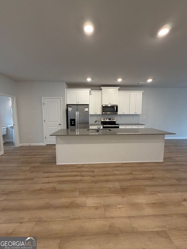 822 Werner Brook Way Southwest Atlanta, GA 30354 - Photo 18 of 55 a view of kitchen with stainless steel appliances granite countertop a stove a sink and a refrigerator