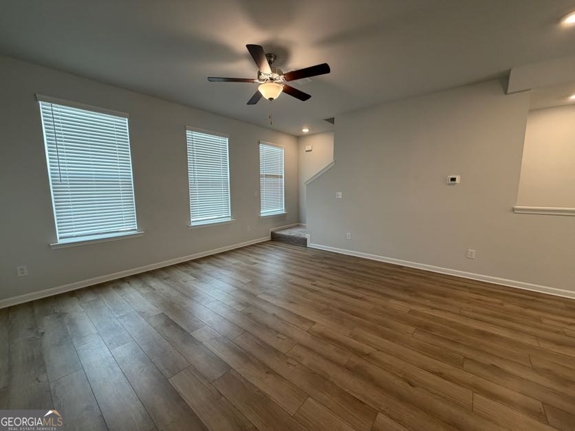 822 Werner Brook Way Southwest Atlanta, GA 30354 - Photo 29 of 55 a view of an empty room with wooden floor and a window