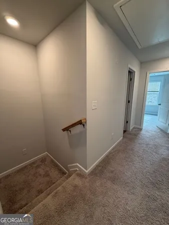 a bathroom with a sink toilet and mirror