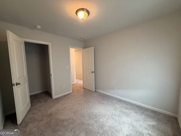 an empty room with a window