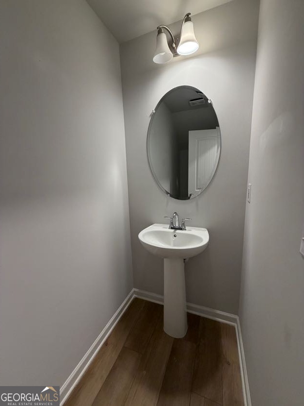 822 Werner Brook Way Southwest Atlanta, GA 30354 - Photo 7 of 55 a bathroom with a sink and a mirror