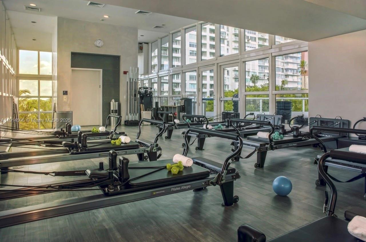 50 South Pointe Drive, Unit 1206 Miami Beach, FL 33139 - Photo 34 of 38 a view of a room with gym equipment