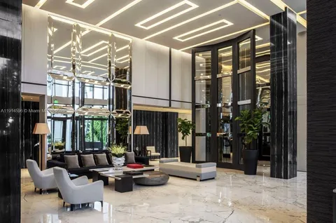 a outdoor dining space with furniture and wooden floor