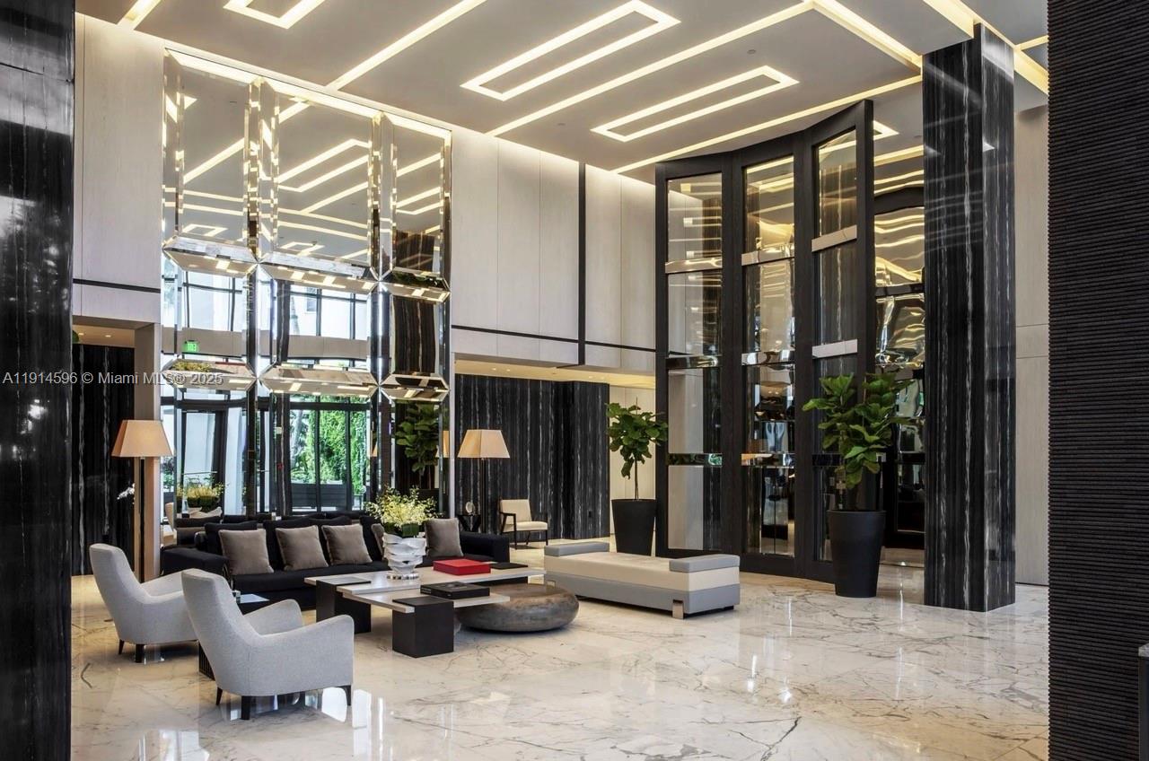 50 South Pointe Drive, Unit 1206 Miami Beach, FL 33139 - Photo 35 of 38 a living room with furniture