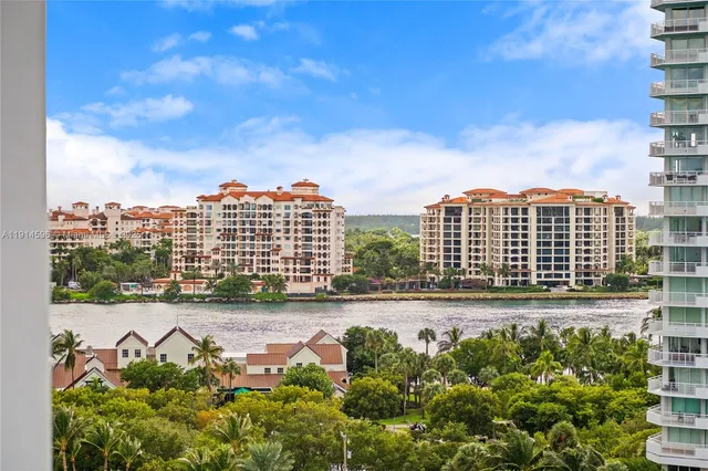 a view of a city with tall buildings