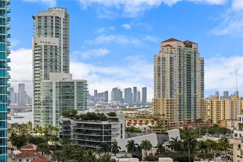 a view of a city with tall buildings