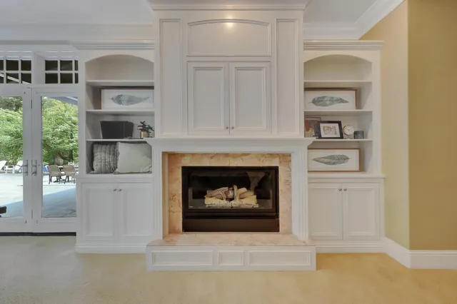 a kitchen with stainless steel appliances granite countertop a stove and cabinets