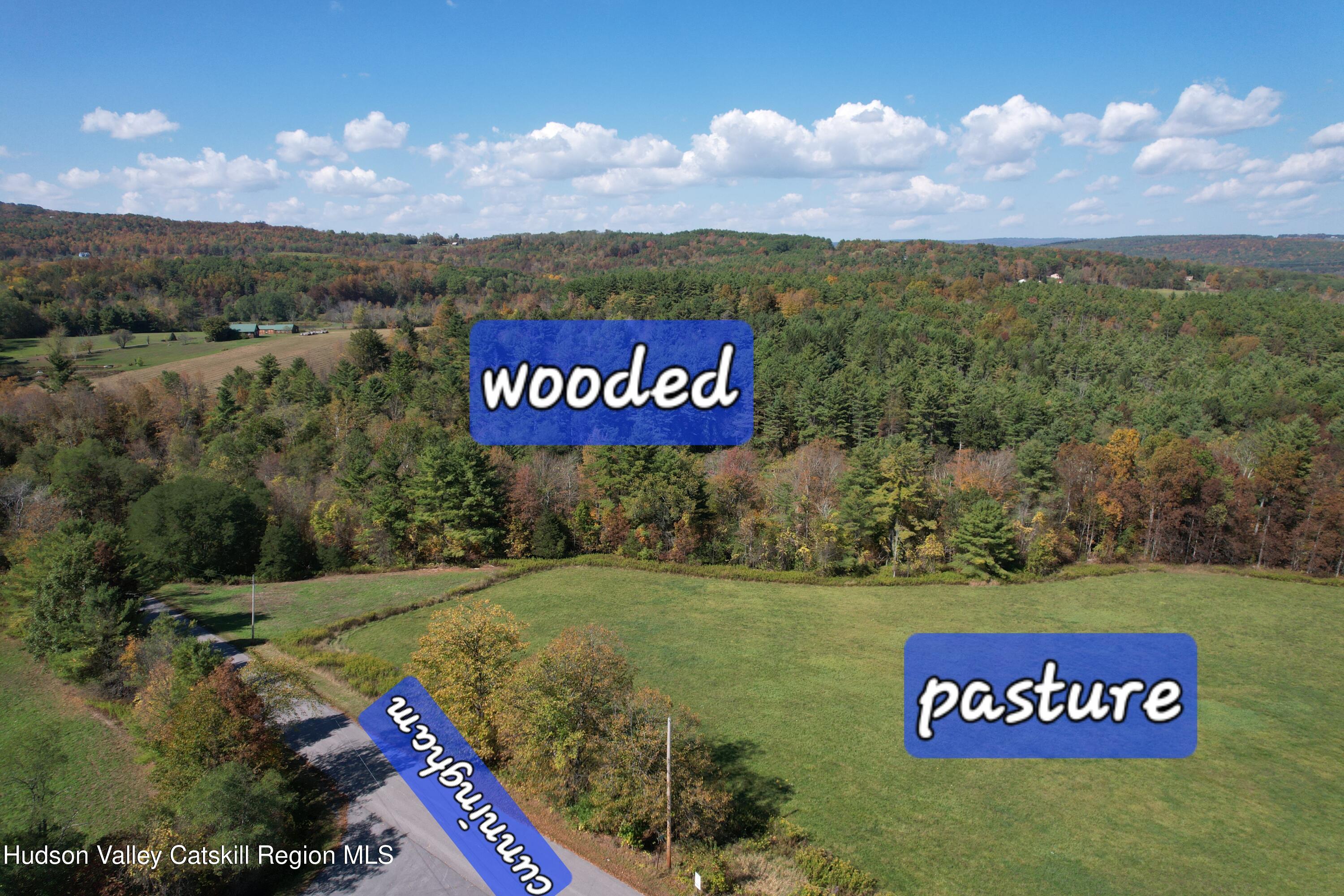 0 Cunningham And Cochrane Road Durham, NY 12422 - Photo 3 of 16 a view of a street with sign board
