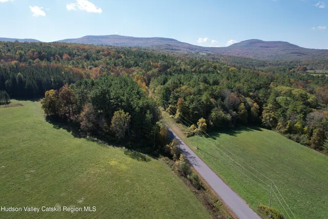 a view of a lake with a mountain in the background