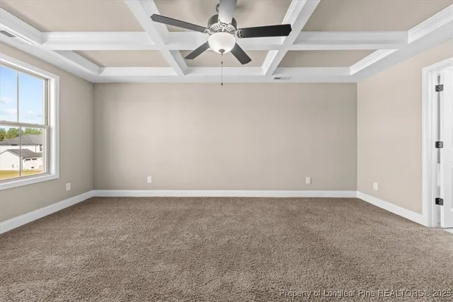 a bathroom with a sink a toilet a mirror and a window