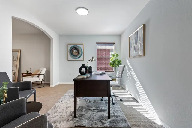 a view of a entryway with furniture and front door