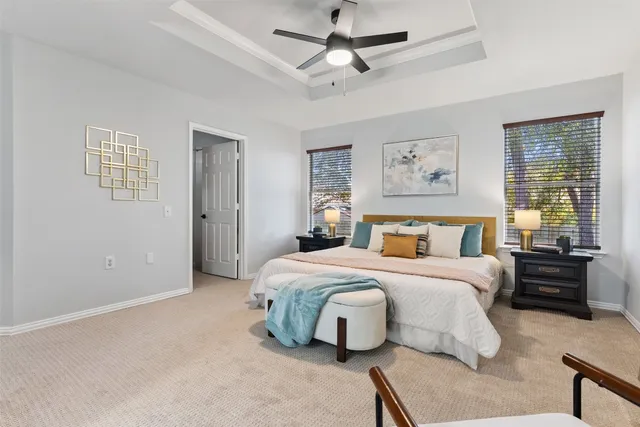 a bedroom with a bed and a couch