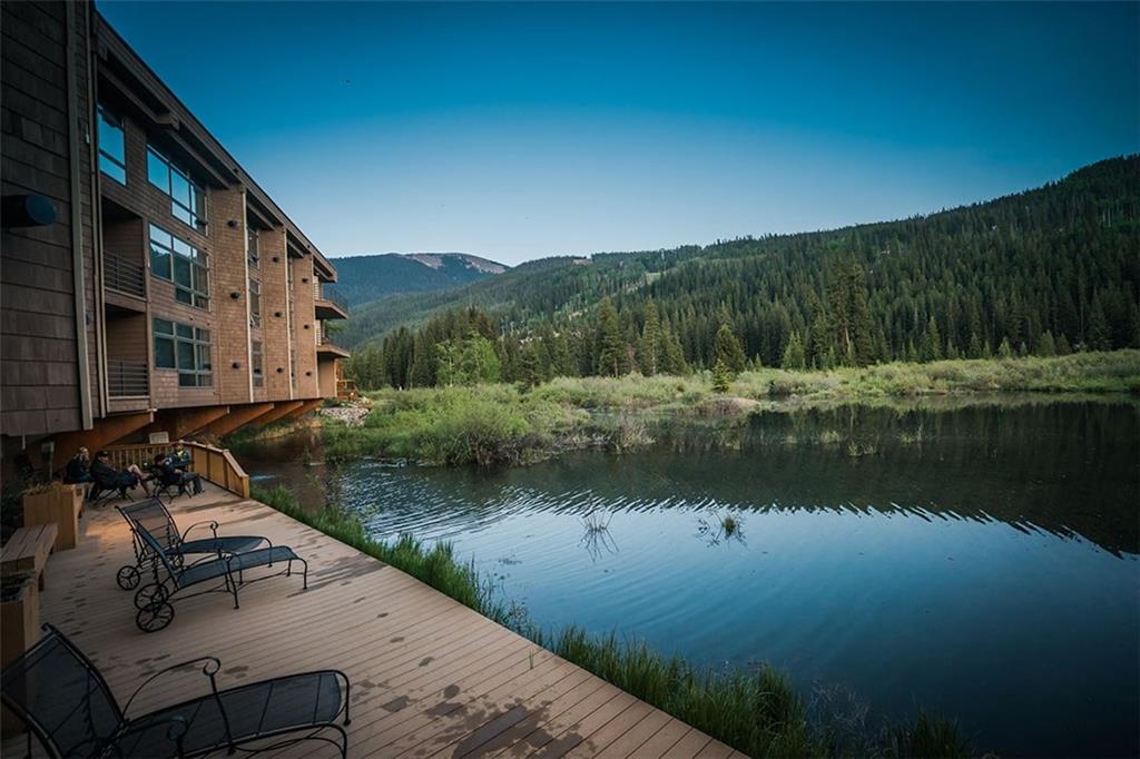 24 River Run Road, Unit 2906 Keystone, CO 80435 - Photo 12 of 15 a view of a lake with a house in the background