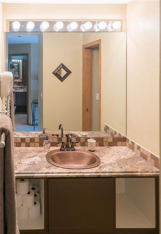 24 River Run Road, Unit 2906 Keystone, CO 80435 - Photo 9 of 15 a bathroom with a sink and a mirror