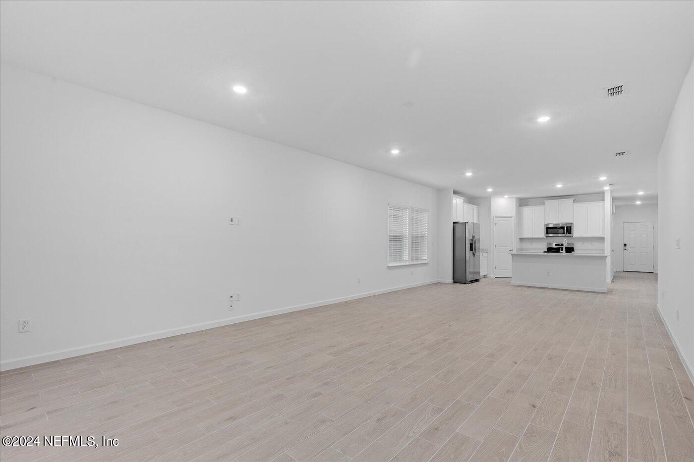 214 Blue Cypress Trail St. Augustine, FL 32084 - Photo 14 of 28 a view of a kitchen with a sink