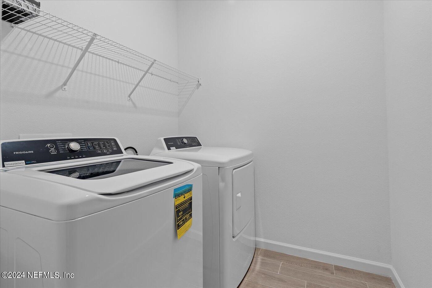 214 Blue Cypress Trail St. Augustine, FL 32084 - Photo 15 of 28 a utility room with dryer and washer