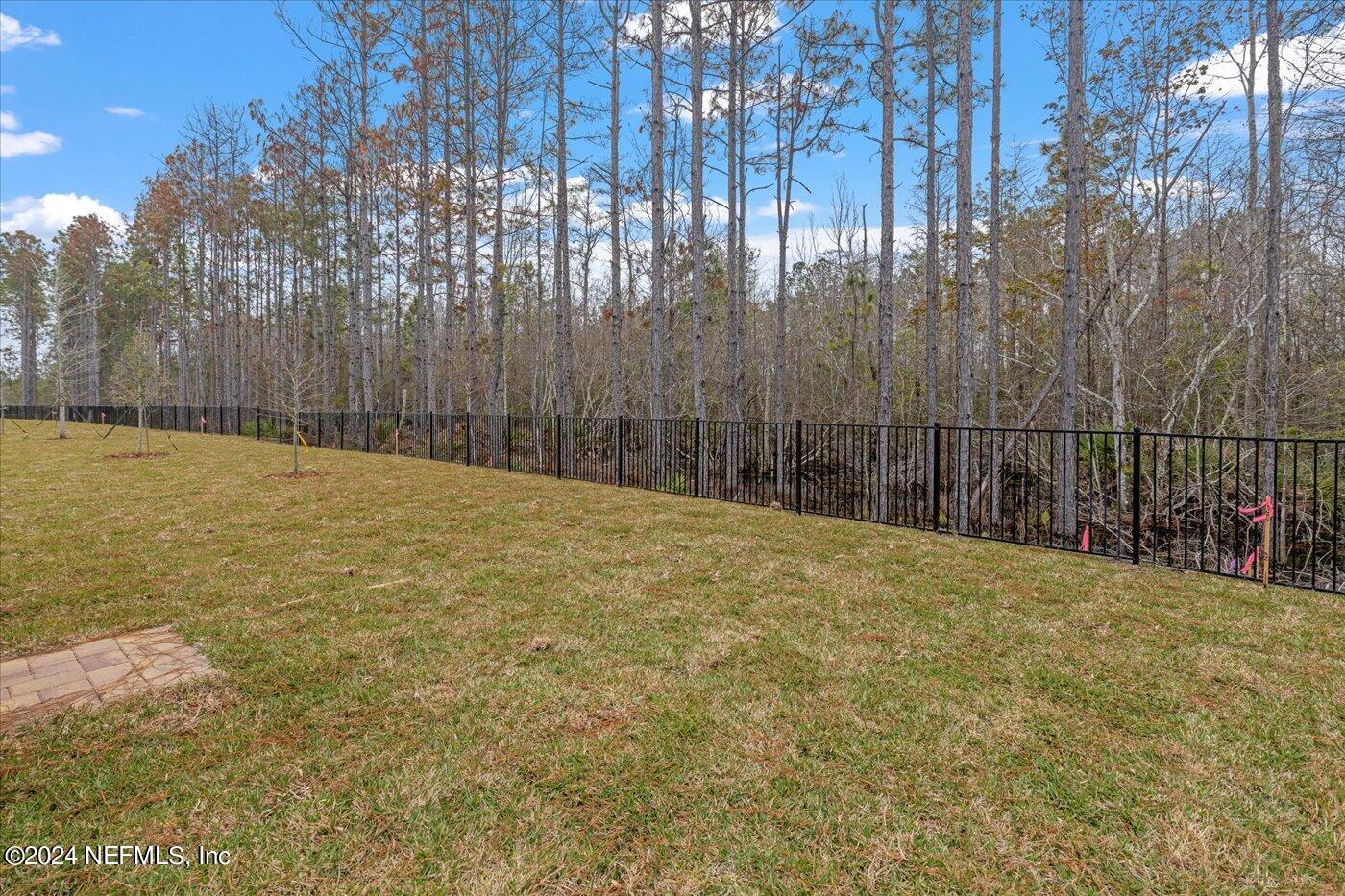 214 Blue Cypress Trail St. Augustine, FL 32084 - Photo 26 of 28 a bathroom with a small yard