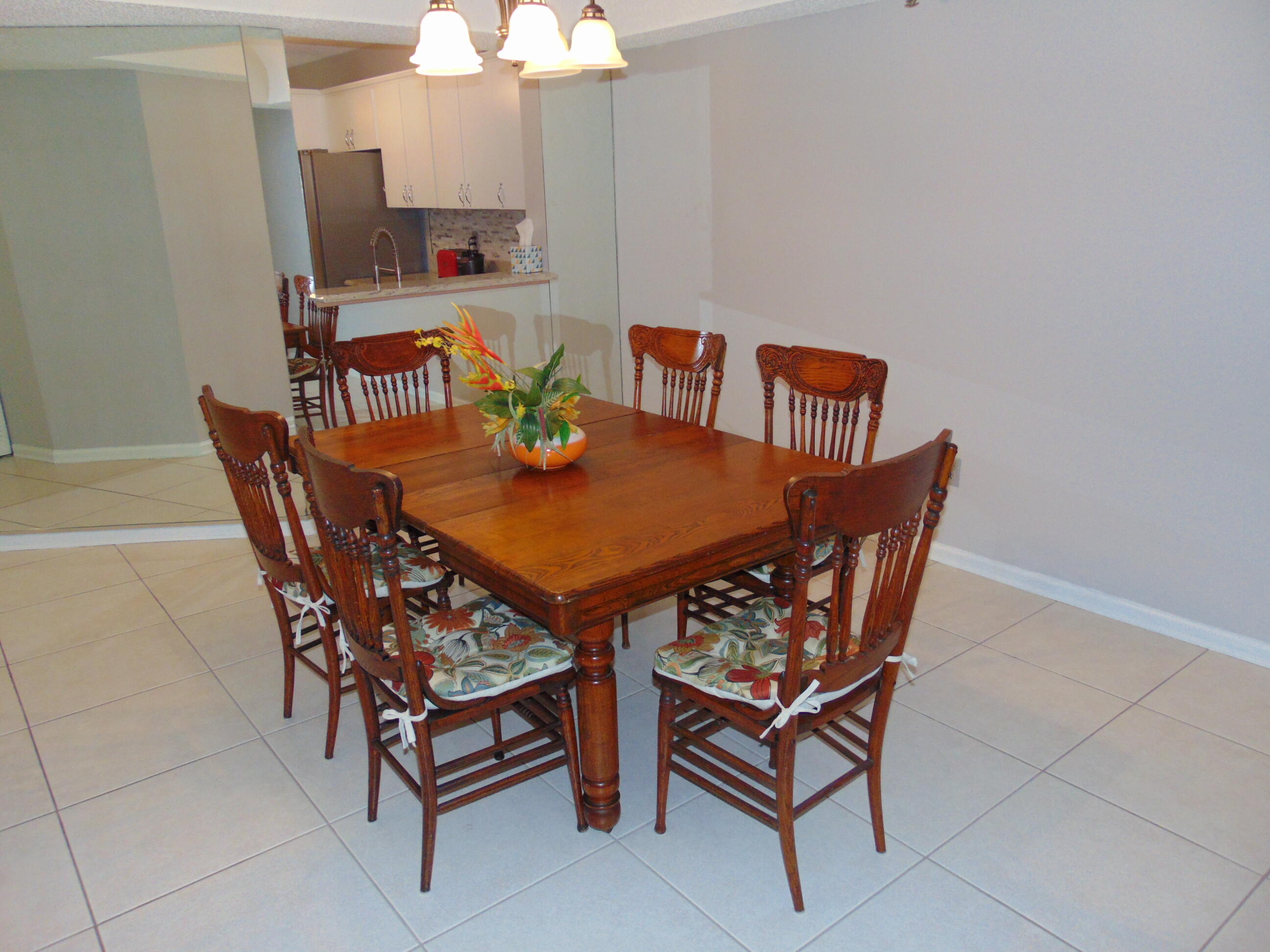 9220 Southwest 14th Street, Unit 3103 Boca Raton, FL 33428 - Photo 15 of 58 a view of a dining room with furniture