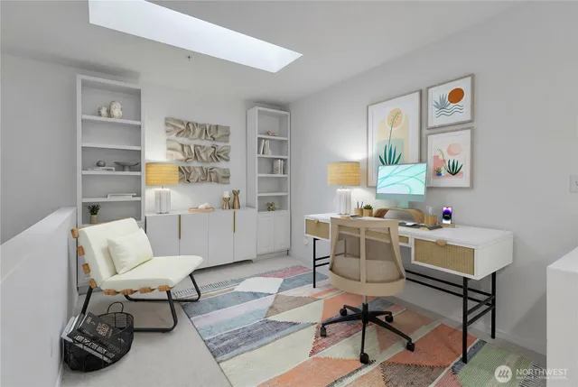 a work room with furniture and a book shelf