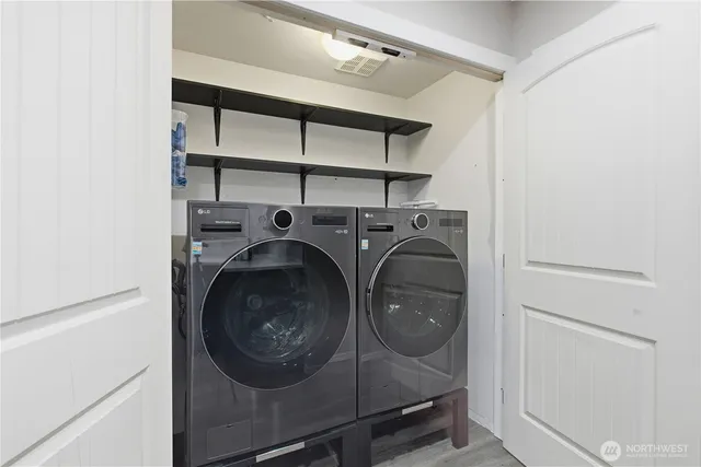 a utility room with dryer and washer