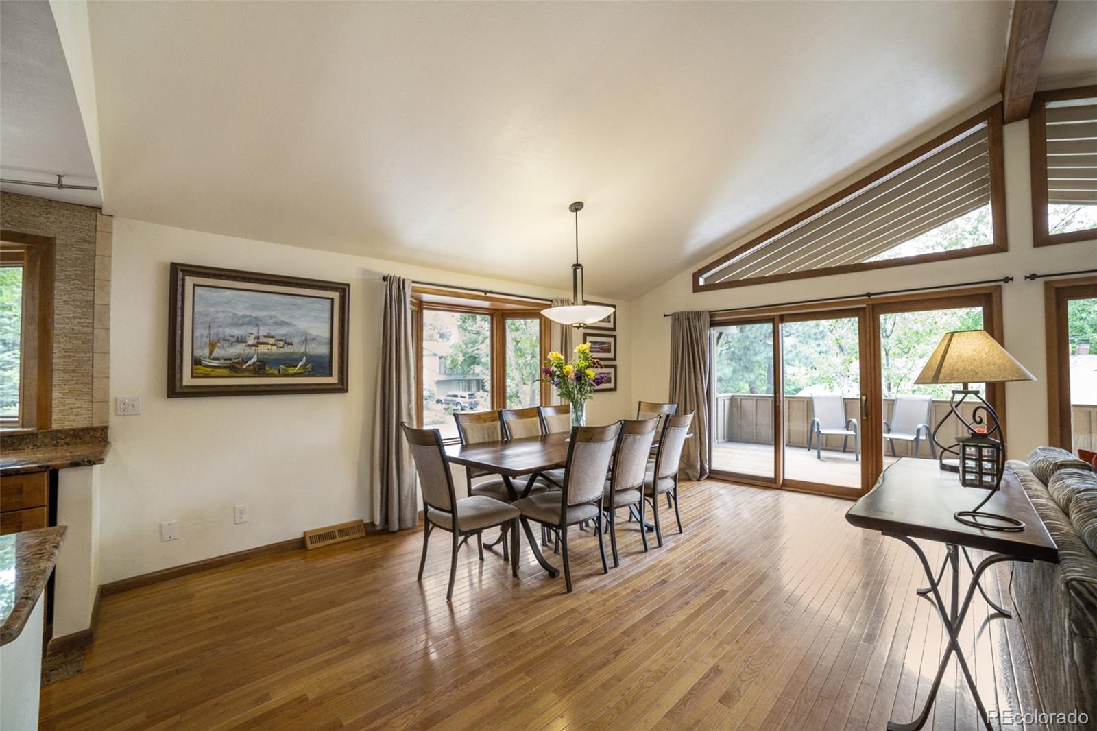 4780 McKinley Drive Boulder, CO 80303 - Photo 12 of 37 a dining room with furniture window wooden floor
