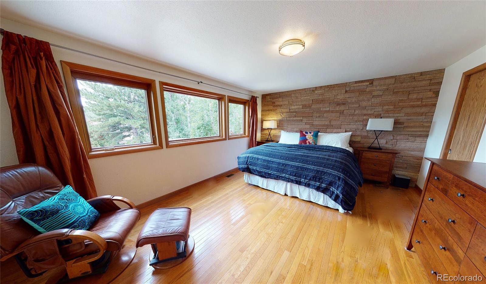 4780 McKinley Drive Boulder, CO 80303 - Photo 13 of 37 a living room with furniture and a window