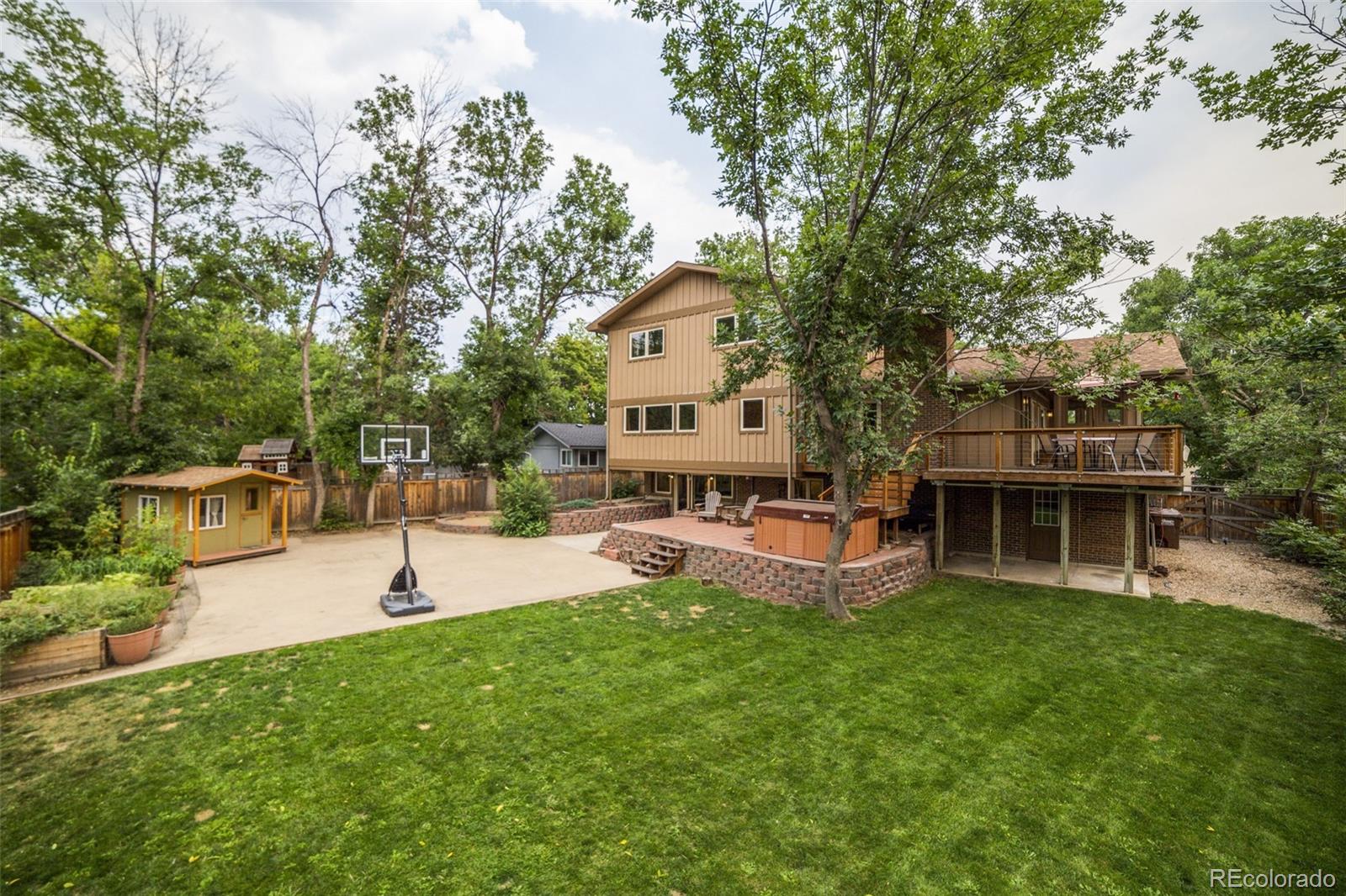 4780 McKinley Drive Boulder, CO 80303 - Photo 2 of 37 a view of a house with swimming pool and sitting area