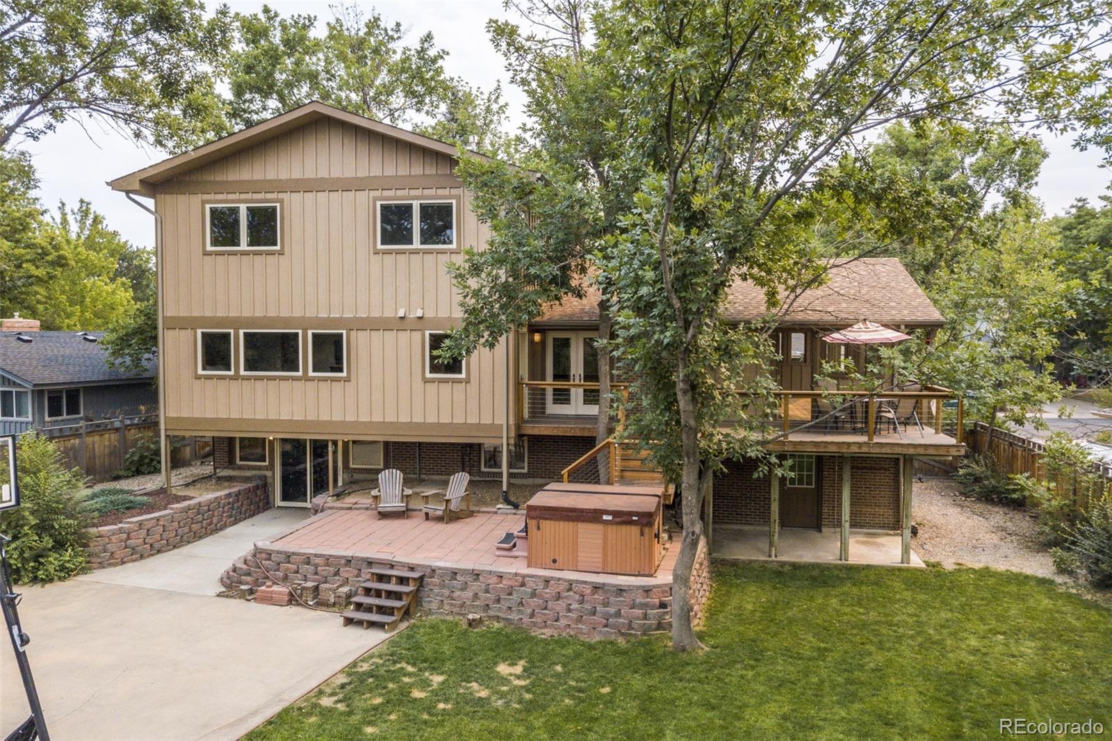 4780 McKinley Drive Boulder, CO 80303 - Photo 25 of 37 a front view of a house with a yard