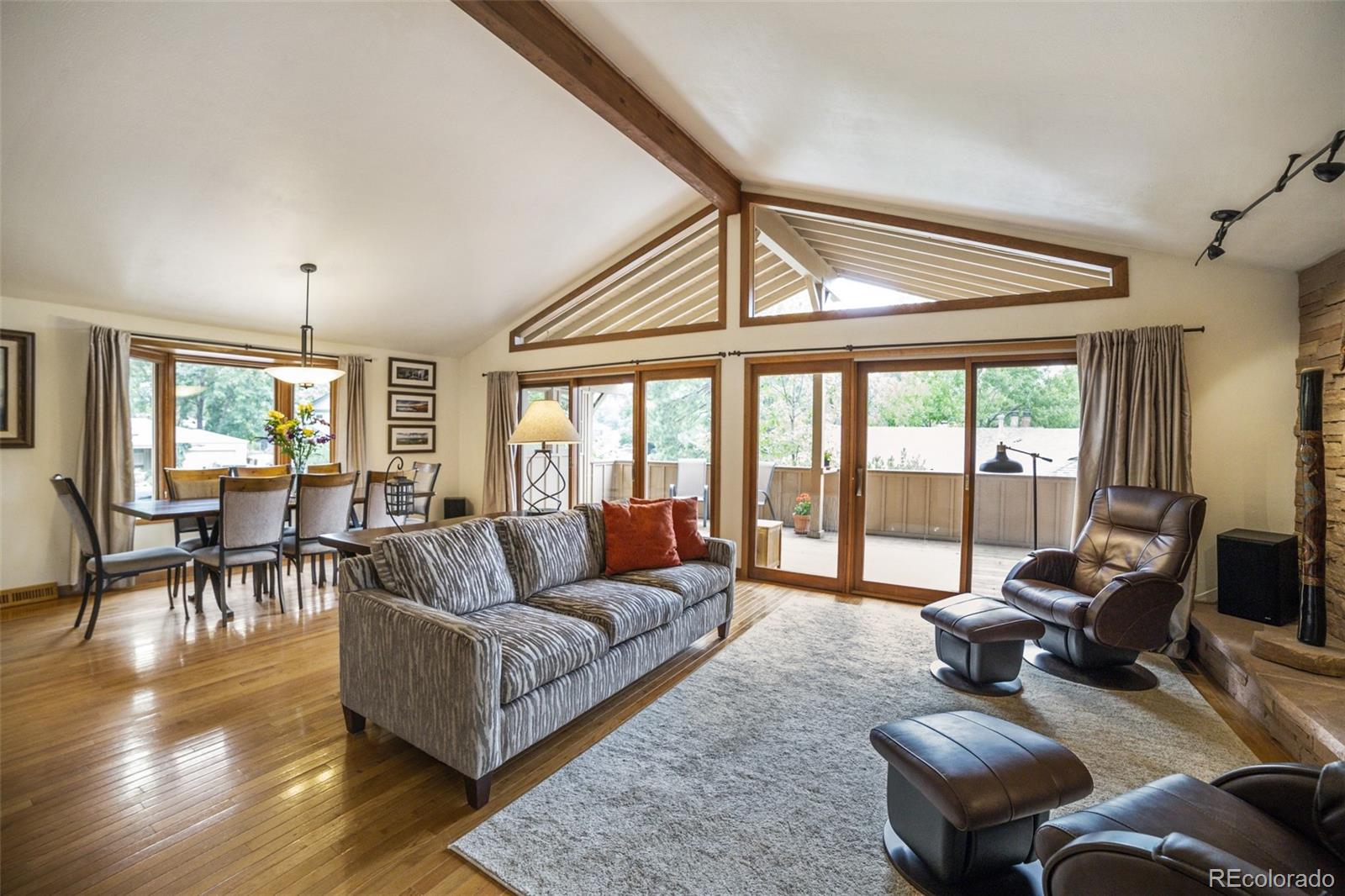 4780 McKinley Drive Boulder, CO 80303 - Photo 3 of 37 a living room with furniture and a large window