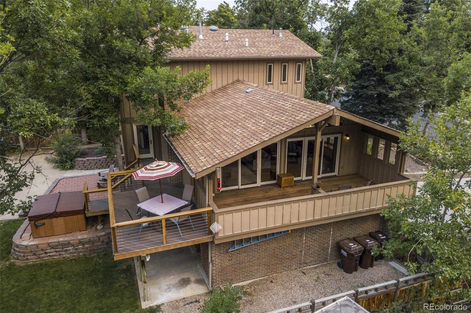 4780 McKinley Drive Boulder, CO 80303 - Photo 33 of 37 an aerial view of a house with swimming pool and sitting area