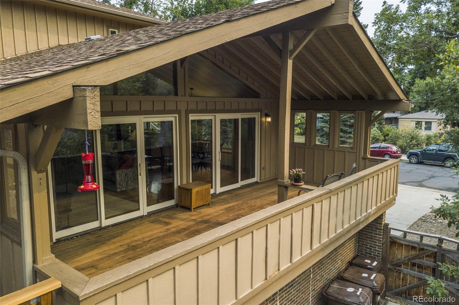 4780 McKinley Drive Boulder, CO 80303 - Photo 34 of 37 a view of a small house with a porch