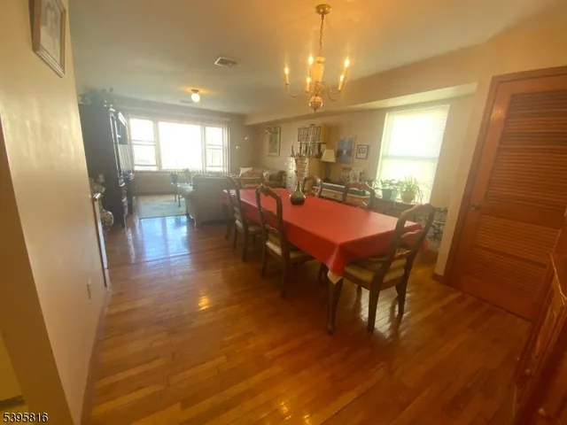 a bathroom with a sink mirror vanity and toilet