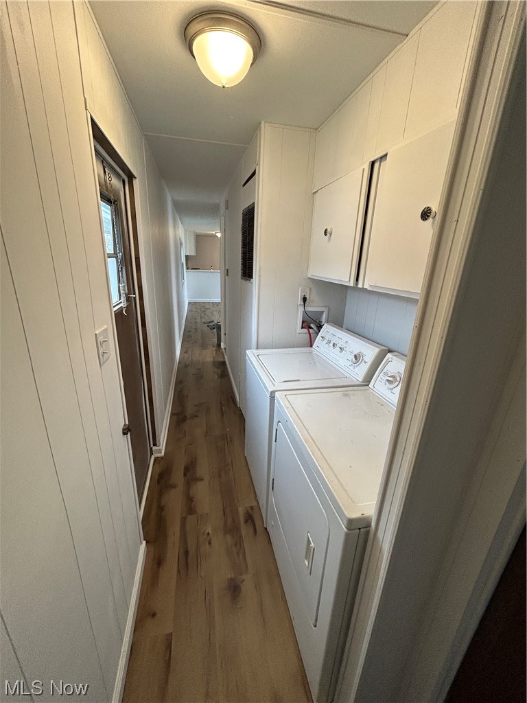 9735 Chillicothe Road, Unit 20 Willoughby, OH 44094 - Photo 8 of 16 Washroom, wood-style floors, washing machine and clothes dryer, cabinets, and hookup for a washing machine