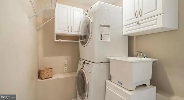 a bathroom with a sink and toilet