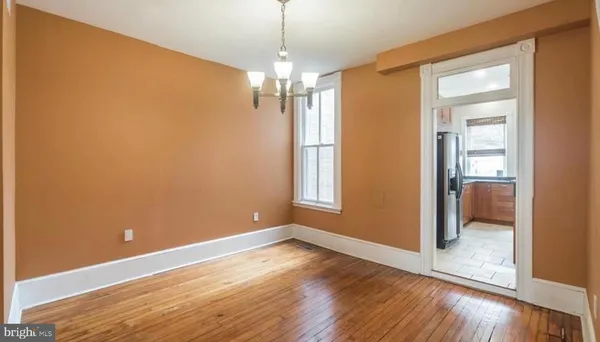 a view of livingroom with hardwood floor and window