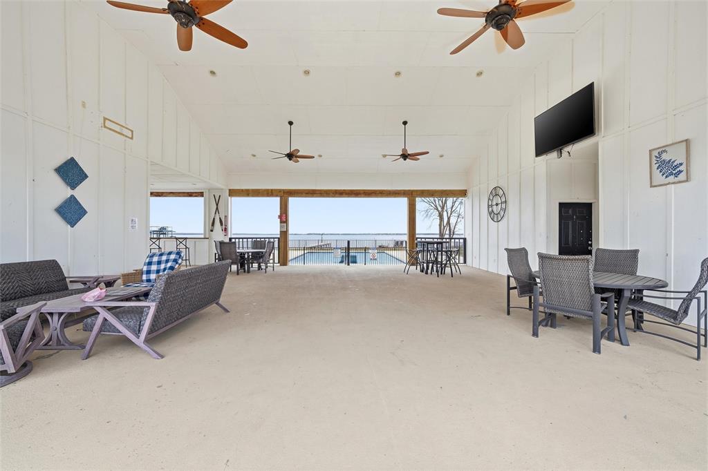5224 Waterfront Road Kerens, TX 75144 - Photo 9 of 10 a living room with furniture and a flat screen tv