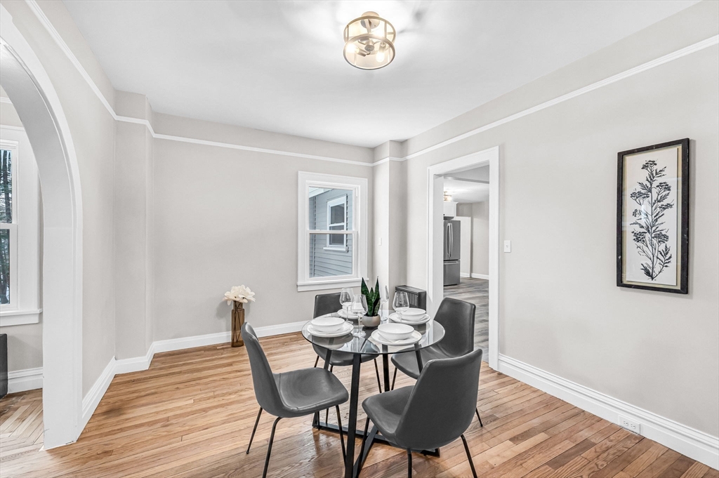 270 South Main Street Orange, MA 01364 - Photo 12 of 41 a view of a dining room with furniture window and wooden floor