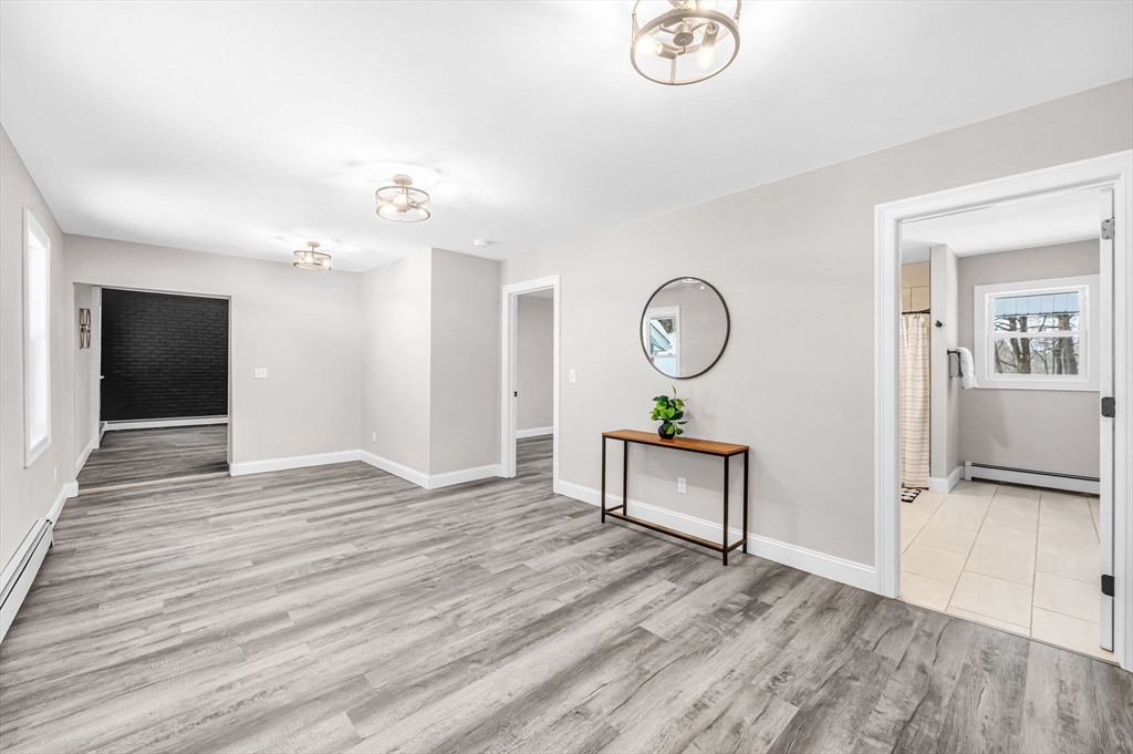 270 South Main Street Orange, MA 01364 - Photo 23 of 41 a view of a room with wooden floor and white walls