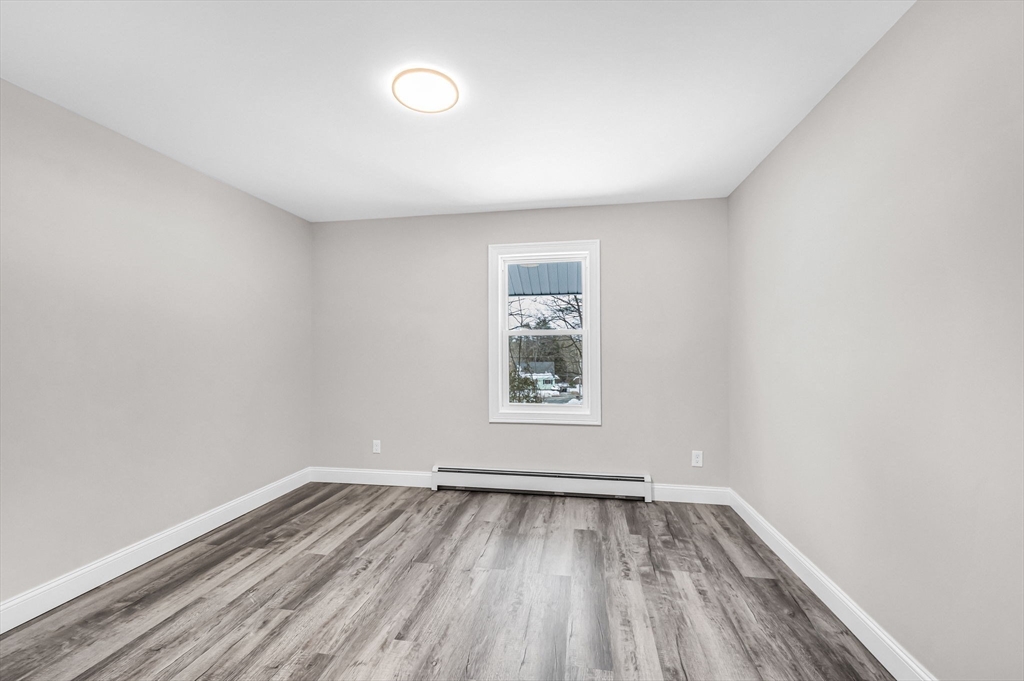 270 South Main Street Orange, MA 01364 - Photo 25 of 41 an empty room with a window