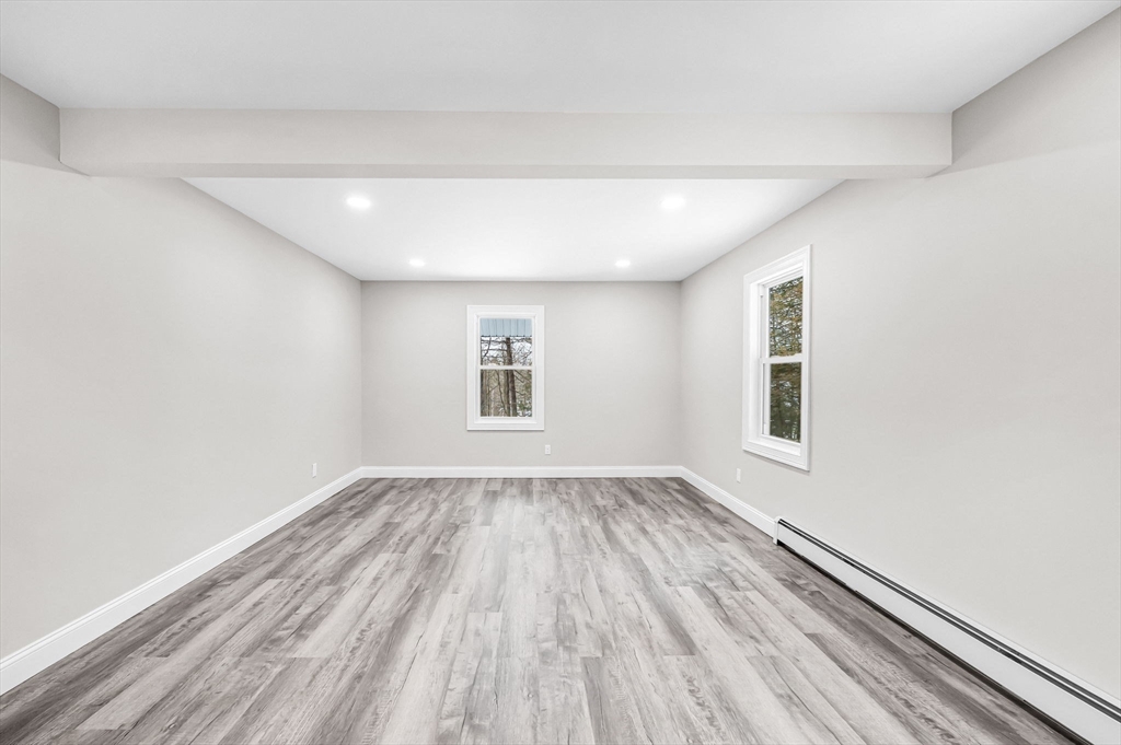 270 South Main Street Orange, MA 01364 - Photo 34 of 41 wooden floor in an empty room with a window
