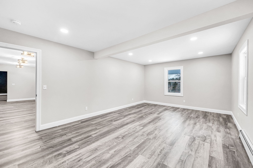 270 South Main Street Orange, MA 01364 - Photo 35 of 41 wooden floor in an empty room with a window