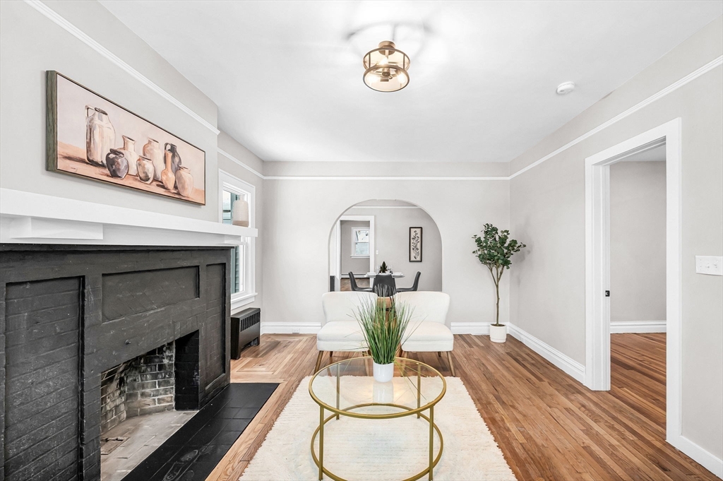 270 South Main Street Orange, MA 01364 - Photo 5 of 41 a living room with furniture and a fireplace