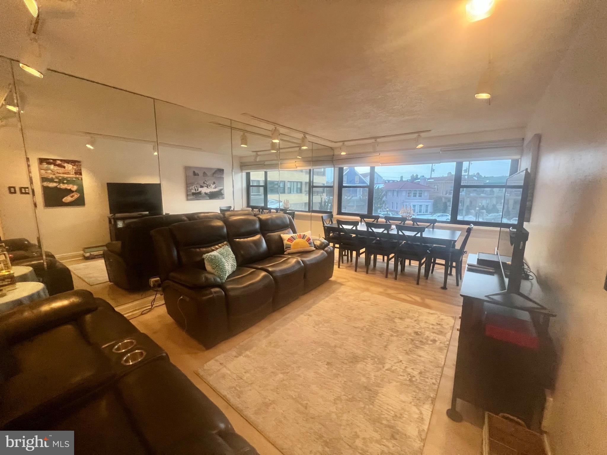 101 South Raleigh Avenue Atlantic City, NJ 08401 - Photo 9 of 24 a living room with furniture and a table