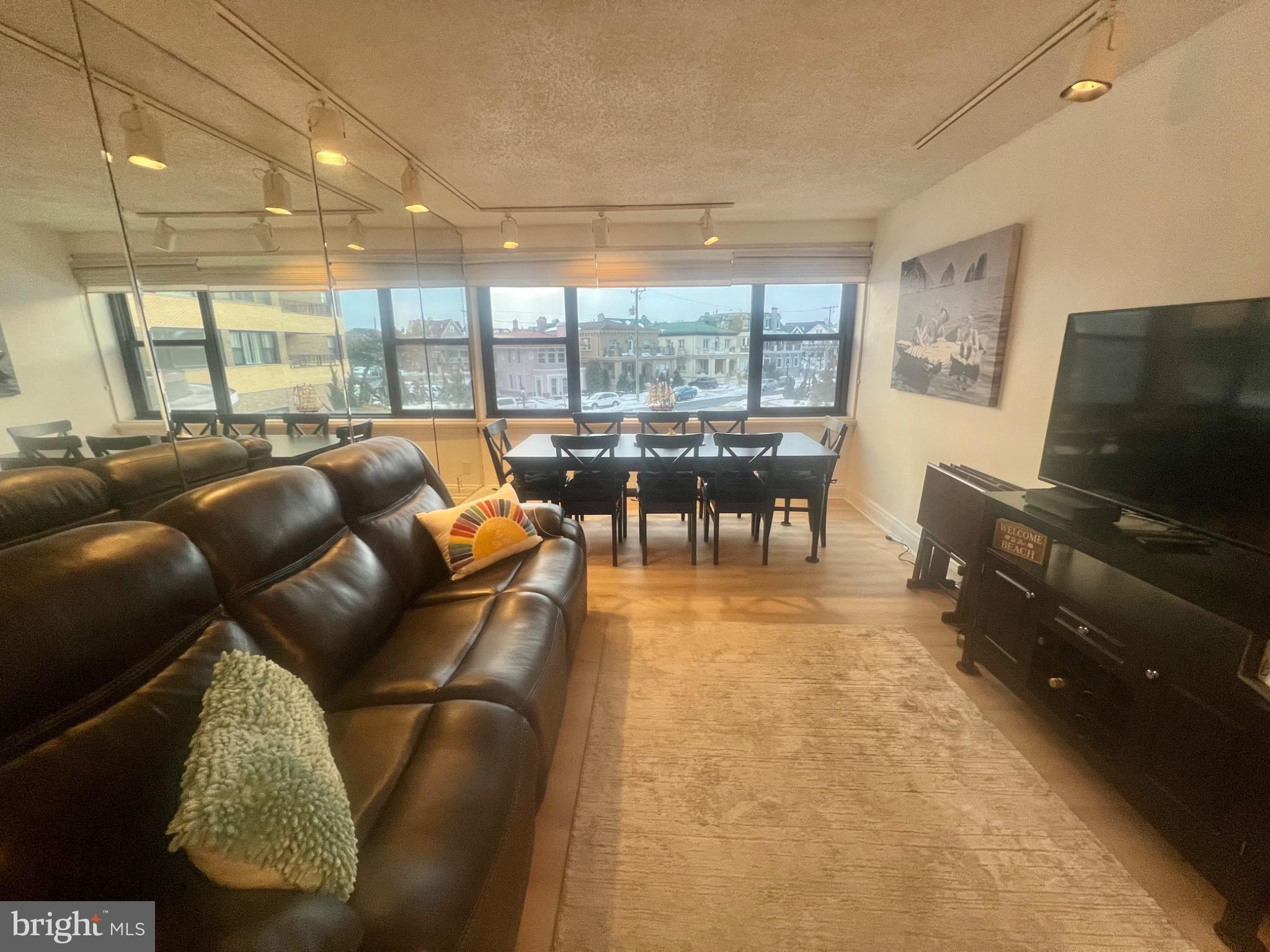 101 South Raleigh Avenue Atlantic City, NJ 08401 - Photo 10 of 24 a living room with furniture and a flat screen tv