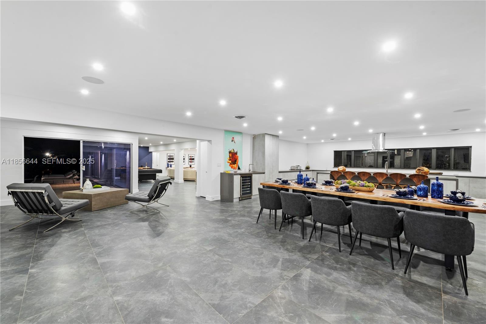 4322 Polk Street Hollywood, FL 33021 - Photo 12 of 43 a view of a living room and dining room