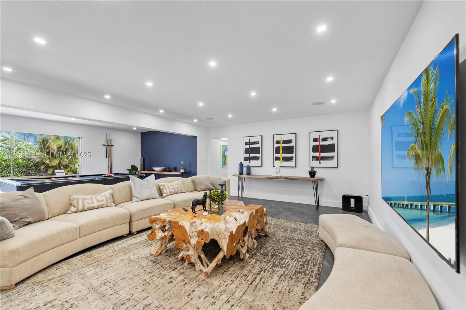 4322 Polk Street Hollywood, FL 33021 - Photo 18 of 43 a living room with furniture and a large window